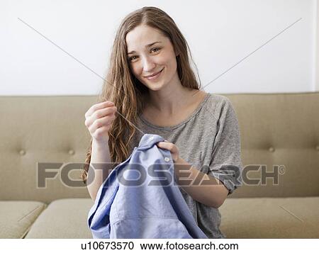 Young woman sawing View Large Photo Image Stock Image - Young woman sawing. Fotosearch
