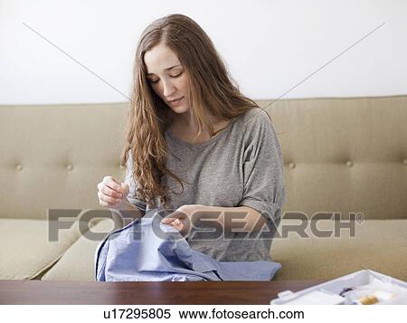Young woman sawing View Large Photo Image Stock Photography - Young woman sawing. Fotosearch