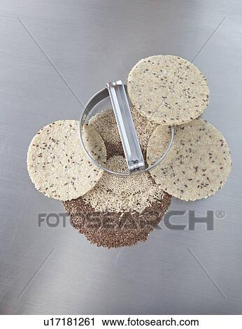 Stock Image - Arepas (Colombian corn bread) made with quinoa. Fotosearch