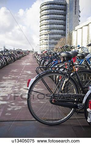 Stock Photography - Bicycles parked on city sidewalk. Fotosearch