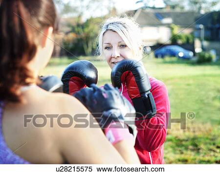 Boxer training with coach outdoors View Large Photo Image Stock Photography - Boxer training with coach outdoors. Fotosearch