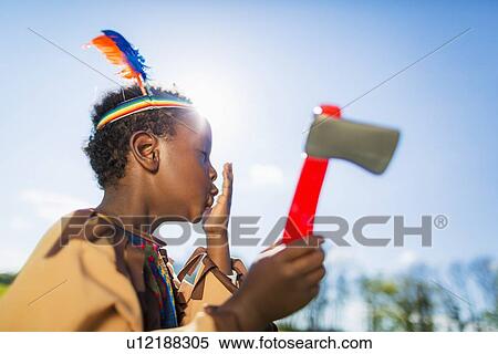 Boy playing dress up outdoors View Large Photo Image Stock Photography - Boy playing dress up outdoors. Fotosearch