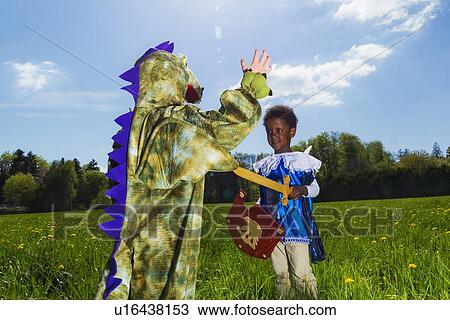 Boys playing dress up outdoors View Large Photo Image Stock Image - Boys playing dress up outdoors. Fotosearch