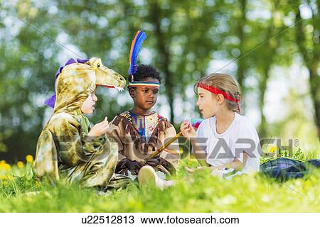 Boys playing dress up outdoors View Large Photo Image Stock Image - Boys playing dress up outdoors. Fotosearch