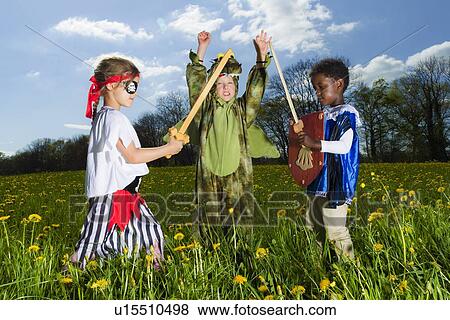 Boys playing dress up outdoors View Large Photo Image Stock Photo - Boys playing dress up outdoors. Fotosearch