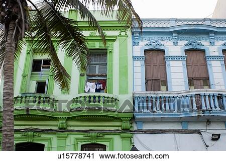 Brightly colored apartment buildings View Large Photo Image Stock Image - Brightly colored apartment buildings . Fotosearch