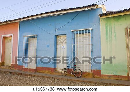 Stock Photo - Brightly colored buildings with gates. Fotosearch