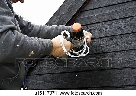 Builder at work on new structure View Large Photo Image Stock Image - Builder at work on new structure. Fotosearch