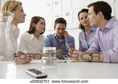 Business people in conference call View Large Photo Image Stock Image - Business people in conference call. Fotosearch