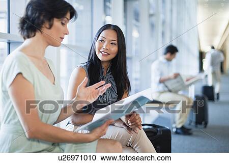 Business people talking in hallway View Large Photo Image Stock Image - Business people talking in hallway. Fotosearch