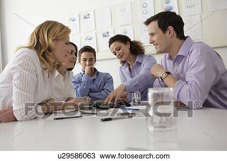 Business people talking in meeting View Large Photo Image Stock Image - Business people talking in meeting. Fotosearch
