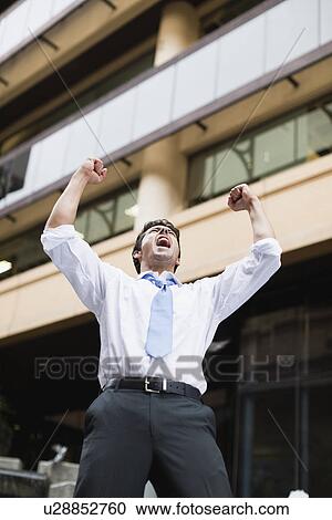 Businessman shouting on city street View Large Photo Image Stock Image - Businessman shouting on city street. Fotosearch