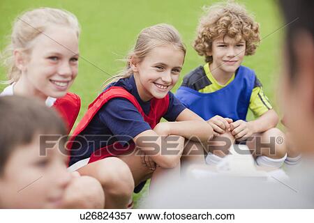 Children laughing during soccer practice View Large Photo Image Stock Photo - Children laughing during soccer practice. Fotosearch