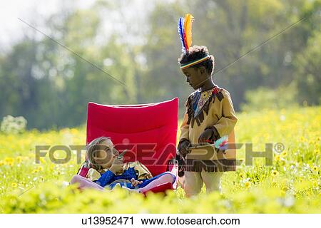Children playing dress up outdoors View Large Photo Image Stock Image - Children playing dress up outdoors. Fotosearch
