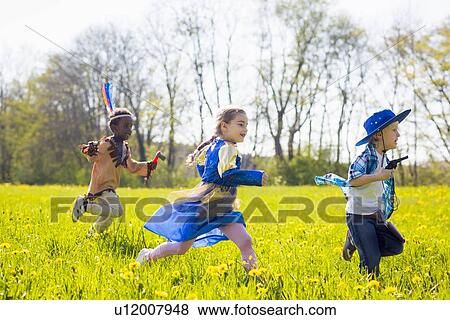 Children playing dress up outdoors View Large Photo Image Stock Photo - Children playing dress up outdoors. Fotosearch