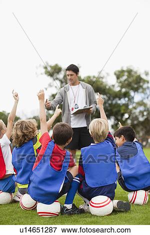 Children raising hands during practice View Large Photo Image Stock Photo - Children raising hands during practice. Fotosearch
