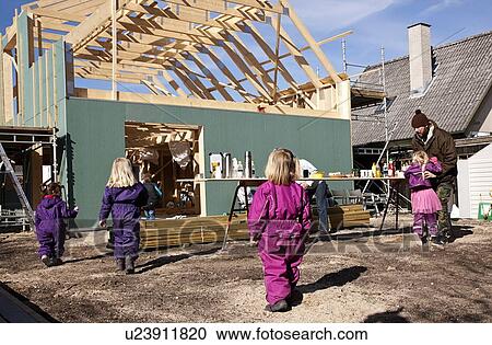 Children walking on construction site View Large Photo Image Stock Image - Children walking on construction site. Fotosearch