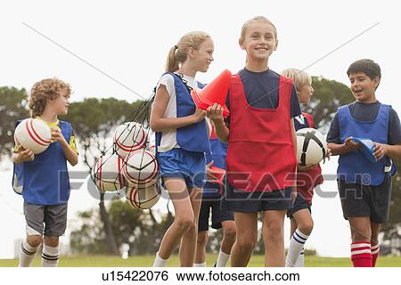 Children walking on soccer pitch View Large Photo Image Stock Photograph - Children walking on soccer pitch. Fotosearch