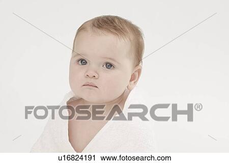 Close up of baby girl wearing bathrobe View Large Photo Image Stock Image - Close up of baby girl wearing bathrobe. Fotosearch