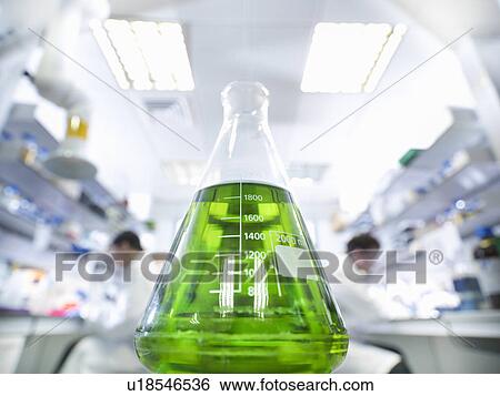 Close up of beaker of liquid in lab View Large Photo Image Stock Photograph - Close up of beaker of liquid in lab. Fotosearch