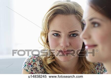 Stock Photography - Close up of businesswomans smiling face. Fotosearch