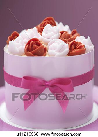 Stock Photograph - Close up of decorated cake. Fotosearch