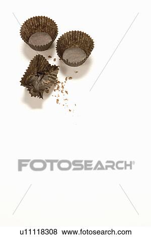 Stock Photo - Close up of empty candy wrappers. Fotosearch