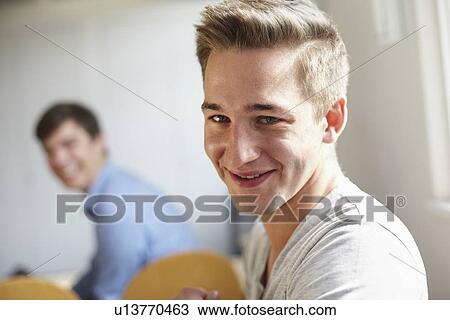 Stock Image - Close up of mans smiling face. Fotosearch
