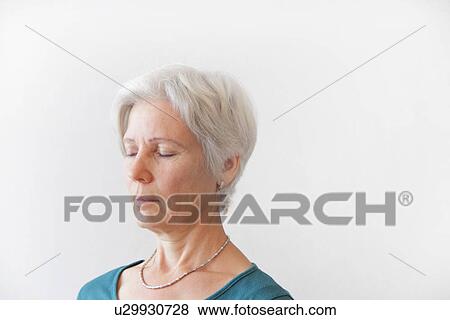 Close up of older womans face View Large Photo Image Stock Photo - Close up of older womans face. Fotosearch