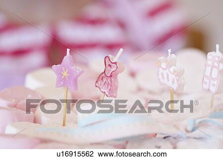 Stock Image - Close up of plate of decorated candies. Fotosearch