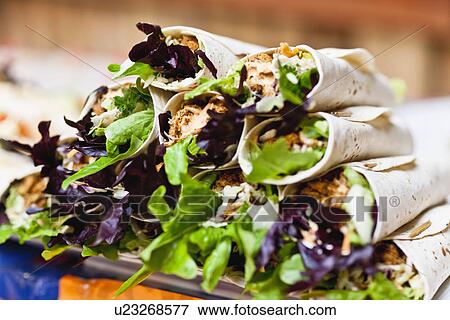 Close up of stack of cajun chicken wraps View Large Photo Image Stock Photo - Close up of stack of cajun chicken wraps. Fotosearch
