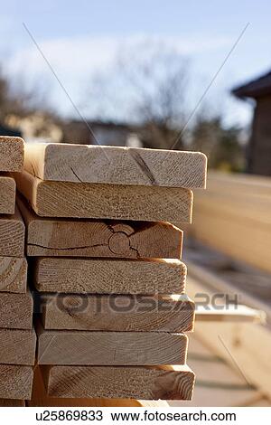 Close up of stacked wood on site View Large Photo Image Stock Image - Close up of stacked wood on site. Fotosearch