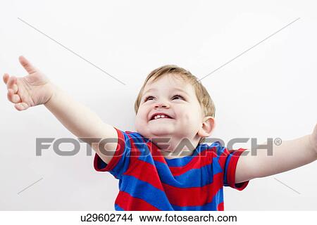 Picture - Close up of toddler boy laughing. Fotosearch