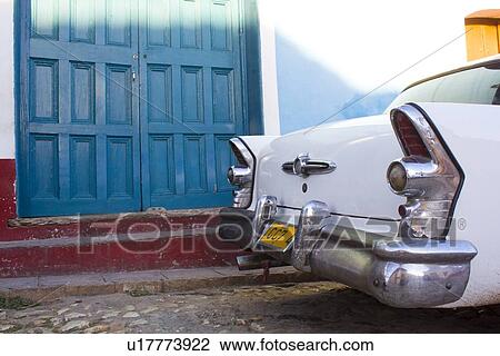 Stock Image - Close up of vintage cars tail lights. Fotosearch
