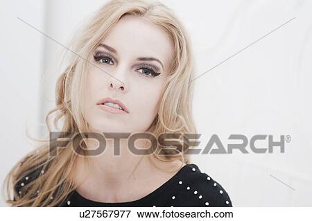 Close up of womans serious face View Large Photo Image Stock Photo - Close up of womans serious face. Fotosearch