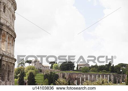 Stock Photograph - Coliseum overlooking Rome. Fotosearch