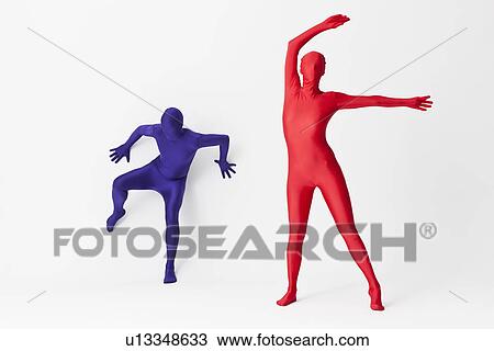 Stock Image - Couple in bodysuits dancing. Fotosearch