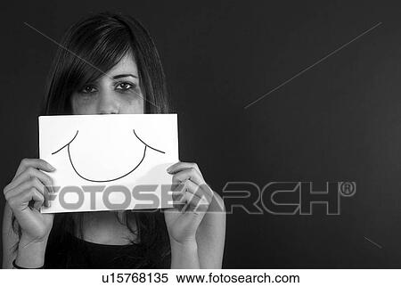 Crying teenage girl holding fake smile View Large Photo Image Stock Photography - Crying teenage girl holding fake smile. Fotosearch