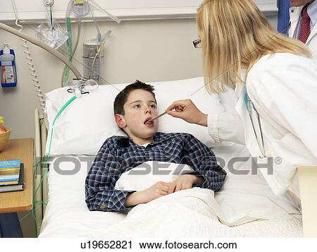 Doctor examining patient in hospital View Large Photo Image Stock Image - Doctor examining patient in hospital. Fotosearch