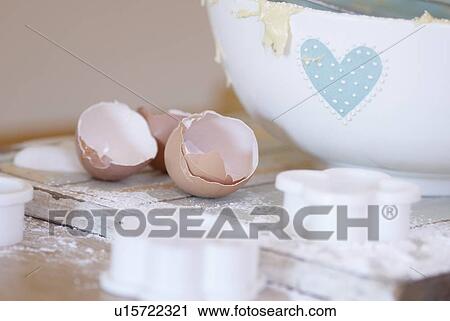 Eggs, cookie cutters and bowl in kitchen View Large Photo Image Stock Image - Eggs, cookie cutters and bowl in kitchen. Fotosearch