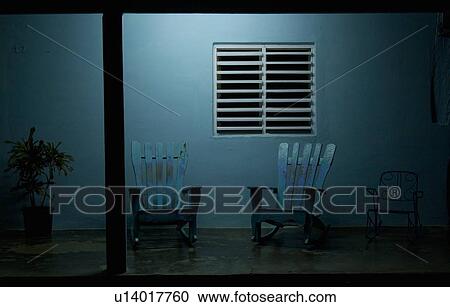 Empty rocking chairs on porch at night View Large Photo Image Stock Image - Empty rocking chairs on porch at night. Fotosearch