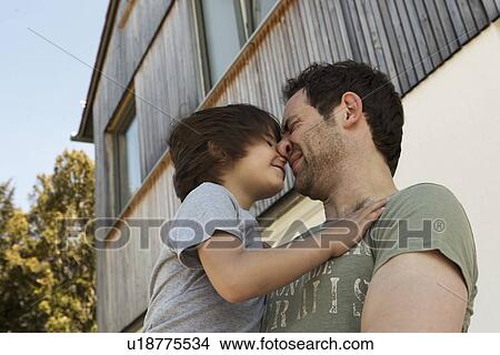 Father and son playing outdoors View Large Photo Image Picture - Father and son playing outdoors. Fotosearch