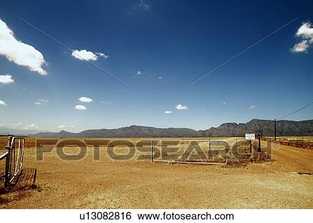 Fence in dry rural landscape View Large Photo Image Stock Photograph - Fence in dry rural landscape. Fotosearch