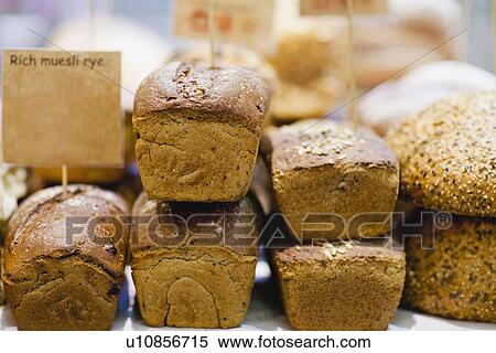 Fresh seed loaf & muesli rye bread for sale View Large Photo Image Stock Photography - Fresh seed loaf & muesli rye bread for sale. Fotosearch