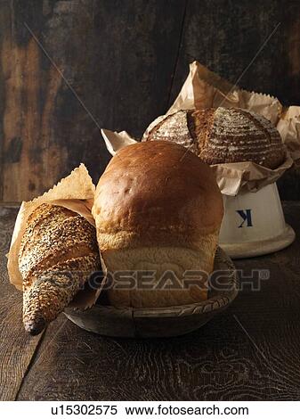 Freshly baked breads in bowls View Large Photo Image Stock Photography - Freshly baked breads in bowls. Fotosearch