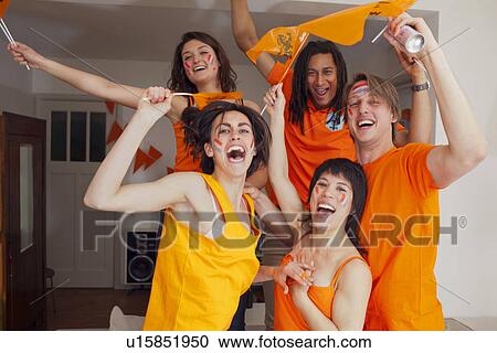 Friends cheering for sports together View Large Photo Image Stock Image - Friends cheering for sports together. Fotosearch