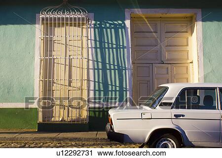 Front door gate casting shadows View Large Photo Image Stock Image - Front door gate casting shadows. Fotosearch