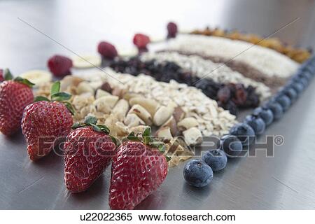 Stock Photography - Fruit and hand made granola/muesli. Fotosearch