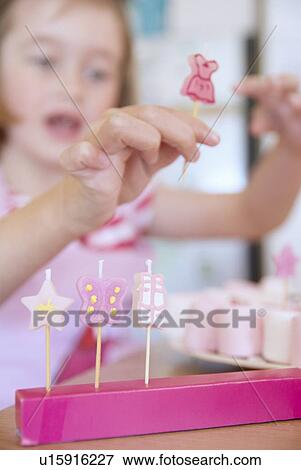 Girl baking in kitchen View Large Photo Image Stock Photo - Girl baking in kitchen. Fotosearch
