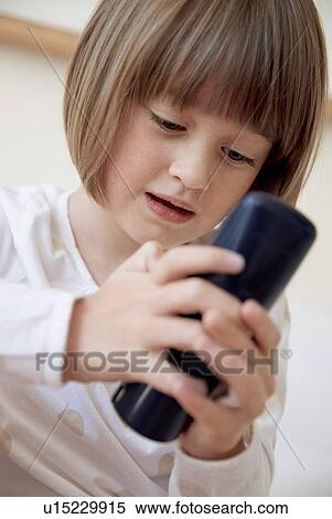 Girl dialing number on telephone View Large Photo Image Stock Photography - Girl dialing number on telephone. Fotosearch